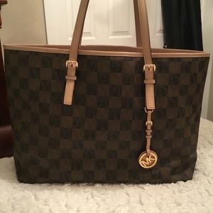 Michael Kors checkered never full handbag.